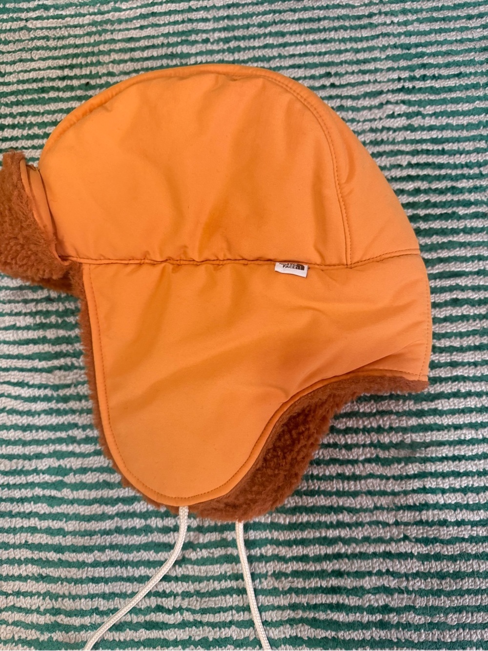 The North Face Orange Trapper Hat with Sherpa Ear Flaps